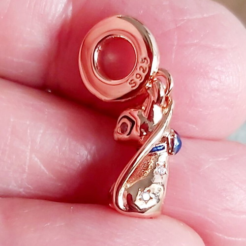 Silver talisman S925 test in pink shade.
