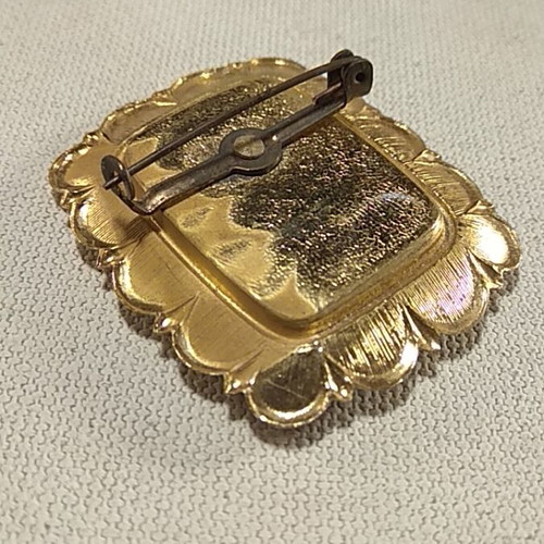 Vintage knight on horse brooch used