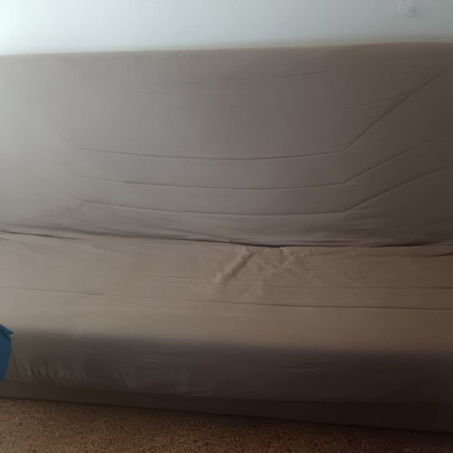 Four-seater sofa bed used