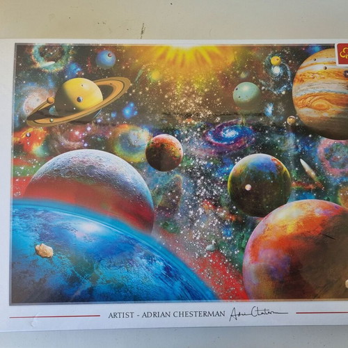 Trefl 1000-piece Cosmos puzzle by Adrian Chesterman