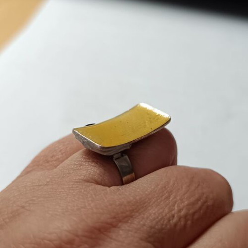 Ring with enamel in yellow and silver tones, new
