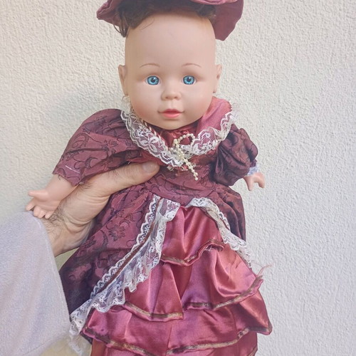 Doll with Victorian dress used, soft body, plastic head