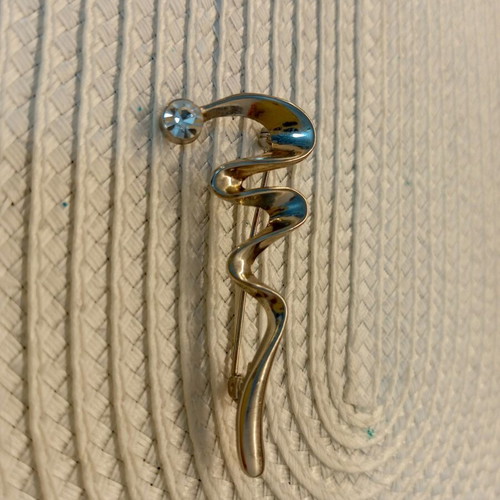 Oriflame brooch like new, silver snake design with crystal