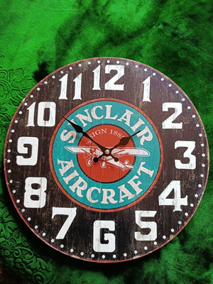 Sinclair Aircraft retro wall clock with airplane design