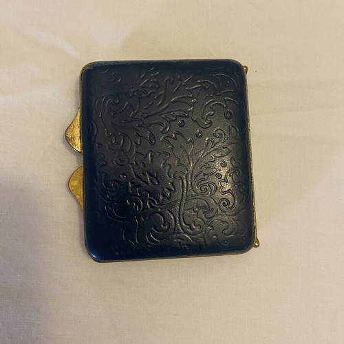 Vintage metal powder compact with mirror, used, black and gold enamel