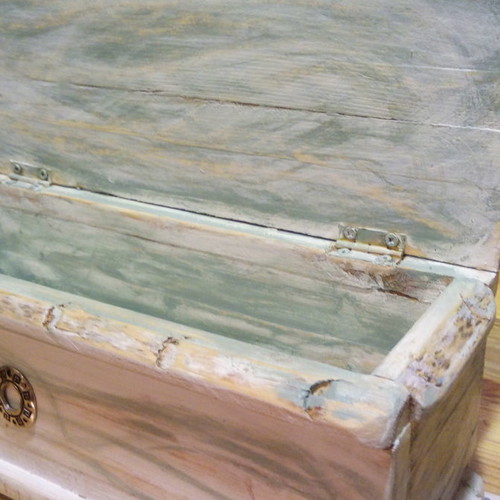 Handmade small furniture chests with varnish and decoration