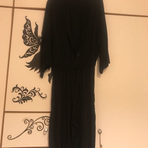 One-piece jumpsuit new, size S/M, with elastic waist and buttons