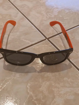 Sunglasses with orange arms like new, black and orange