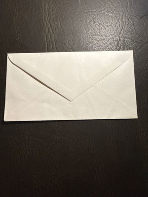 Classic white paper envelope new, triangular flap