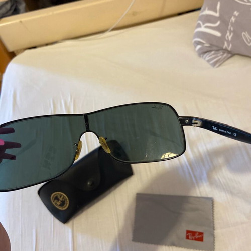 Rayban men's sunglasses used with small circular scratches