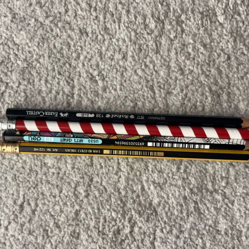 Pencils like new, set of 4 with various designs