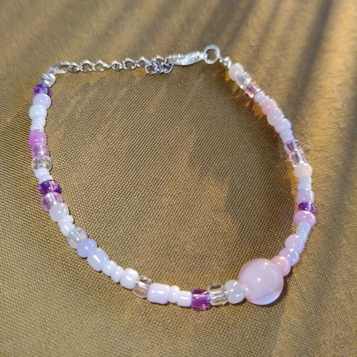 Handmade pink bracelet with silver elements
