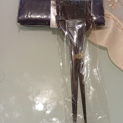 Hair care accessories set with pink afro pick comb and hair dye brushes