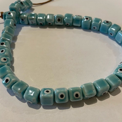Enamelled ceramic evil eye beads new, pack of 100, turquoise