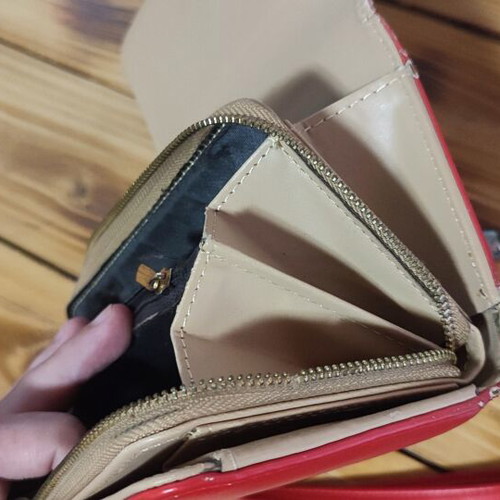 Verde red leather wallet, worn front and broken zipper