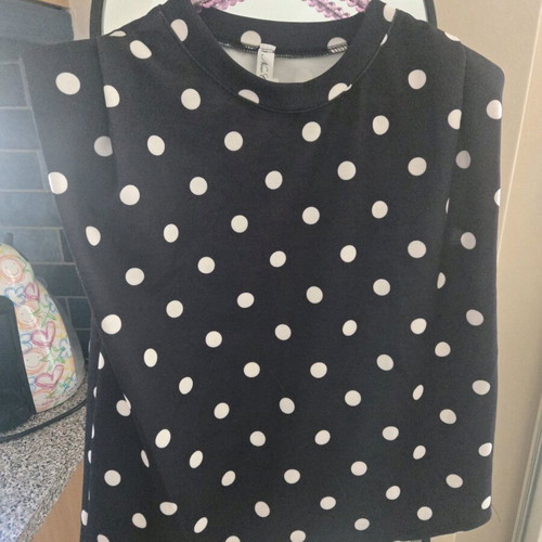 Sleeveless polka dot top new, black and white
