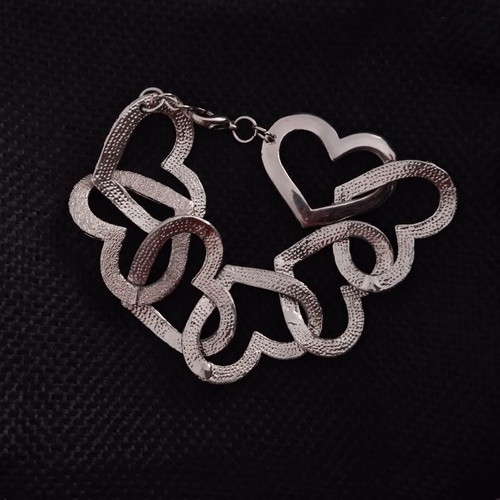 Silver heart bracelet used