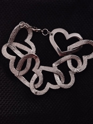 Silver heart bracelet used