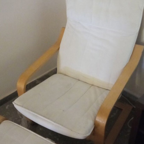 IKEA armchair with footstool used, wooden frame and removable cotton covers