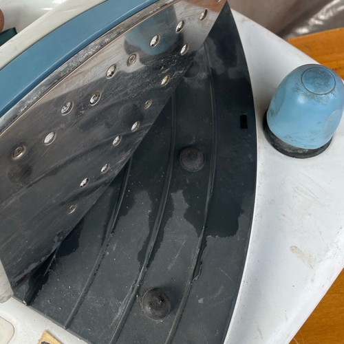 Stirella 900 ironing system used with rich steam