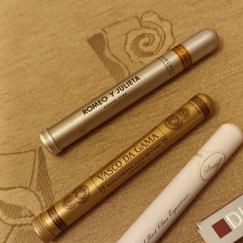 Vintage Dunhill matchboxes and aluminum cigar tubes used set
