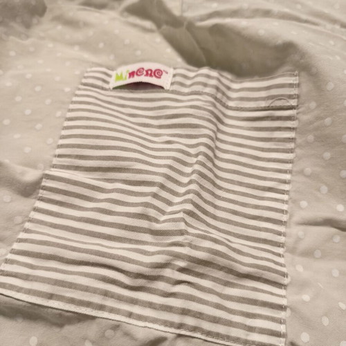 Nursing cover with storage pouch used