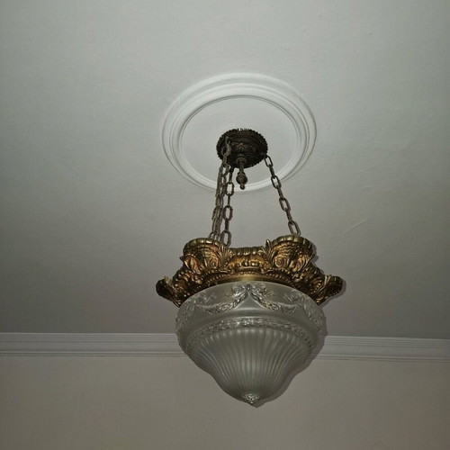 Antique brass ceiling light used with carved glass cover