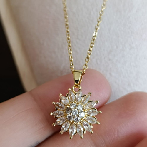 Necklace from stainless steel with zircon like new, gold tone, rotating