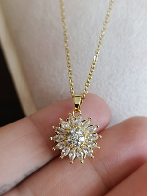 Necklace from stainless steel with zircon like new, gold tone, rotating