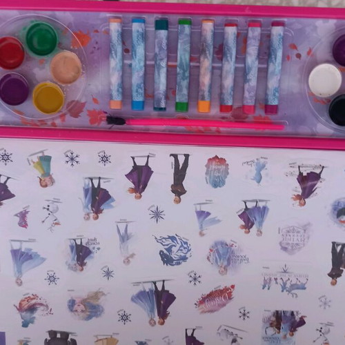 Large painting pad with watercolors and crayons used, Frozen theme