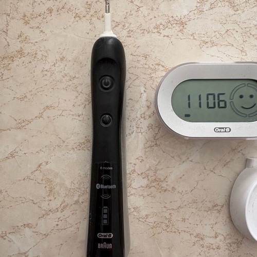 Oral-B Triumph IQ 5000 electric toothbrush used