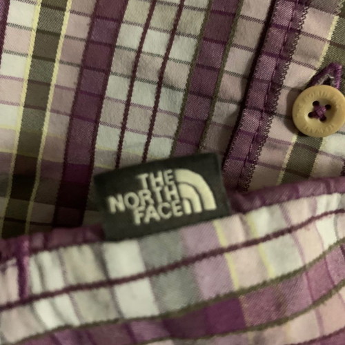 The North Face shirt used, women's large, white and purple