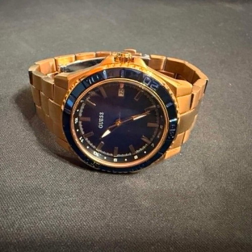 Guess W0469L2 watch used, stainless steel rose gold, blue dial 36mm
