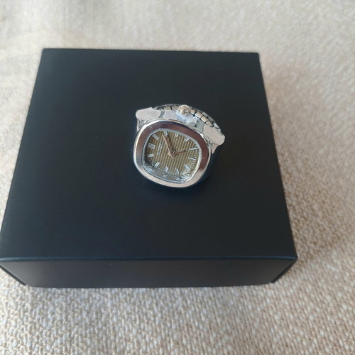 Ring watch with khaki dial and silver bracelet like new