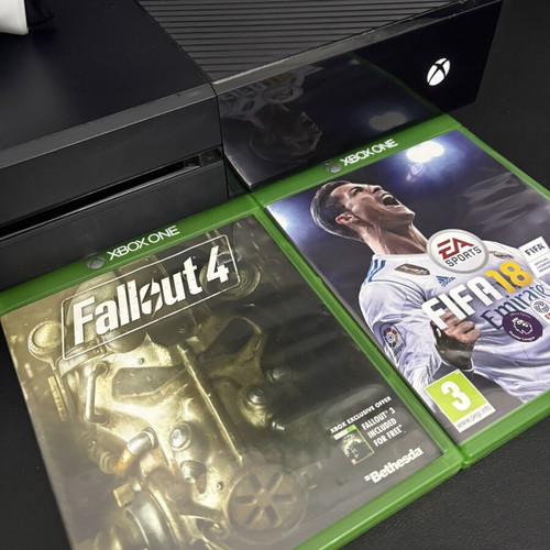 Xbox One 1TB console used with controller and 2 games