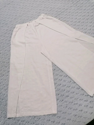 White zip culottes used, size M, with front slit and elastic waist