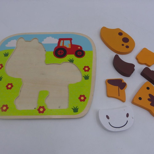 Wooden puzzle with horse animal used for babies