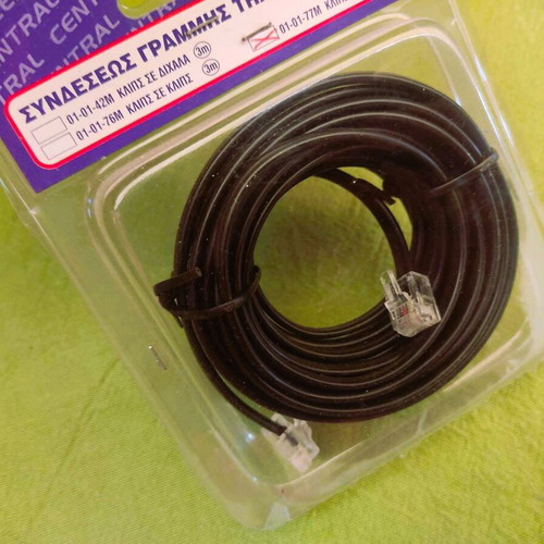 Telephone cable 6m new, black with clips