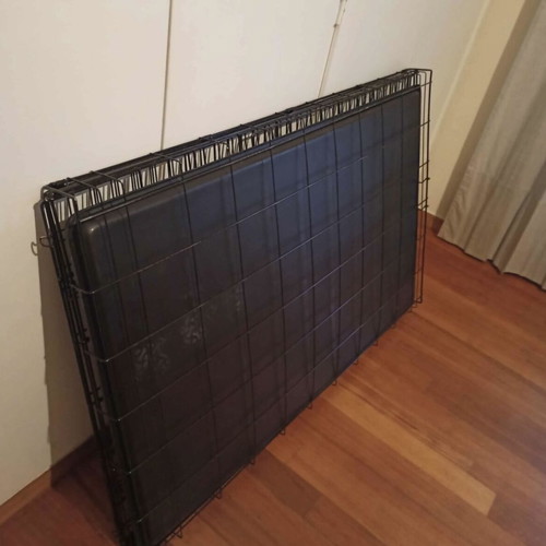Large dog crate like new, foldable with two doors