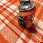 Coca Cola lighter used