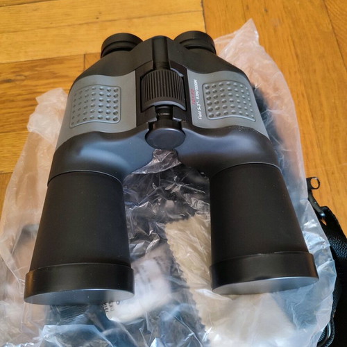 Binoculars new with carrying case, manual and cleaning cloth