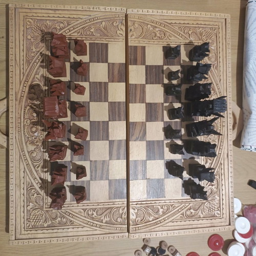 Carved backgammon/chess used with wooden Aztec-style pieces