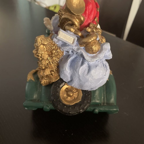 Christmas decoration Santa Claus in vintage car like new