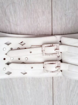 Wide belt used white with rhinestones and diamond pattern