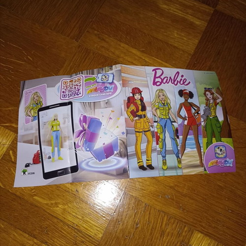 Barbies plastic figure new with suitcase