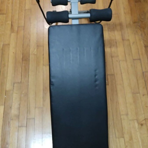 Folding Exercise Bench with Resistance Bands like new