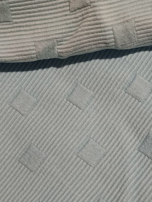 Quilted blanket and square pillowcase used