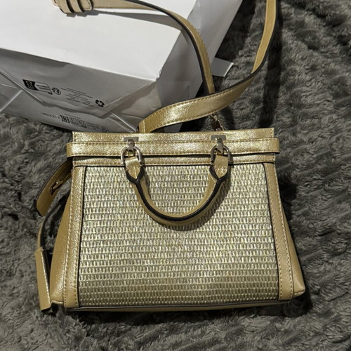 Guess gold shoulder bag with woven front design