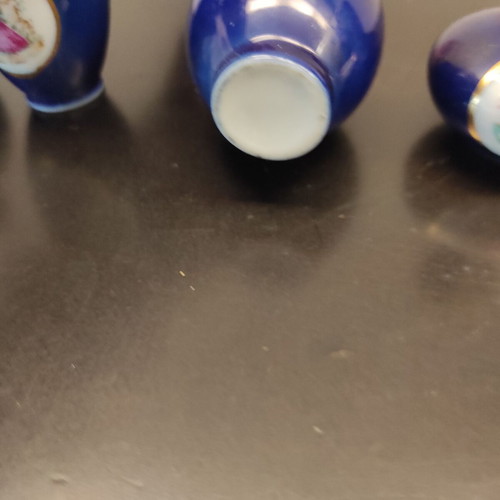 Porcelain decorative small vases like new, set of 5 pieces