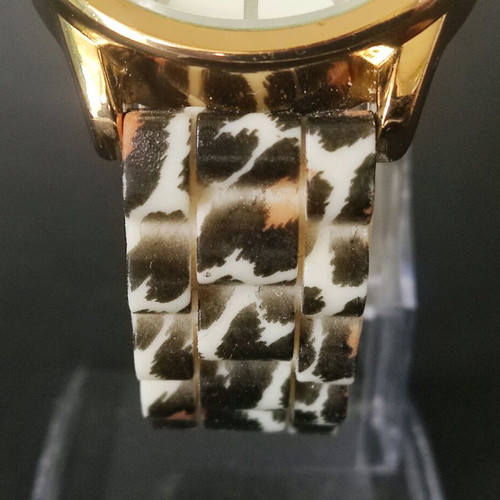 Watch with leopard silicone strap like new, women's